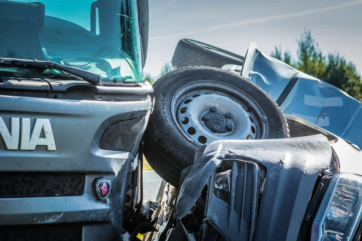 Crash site showing auto and truck accidents with damage