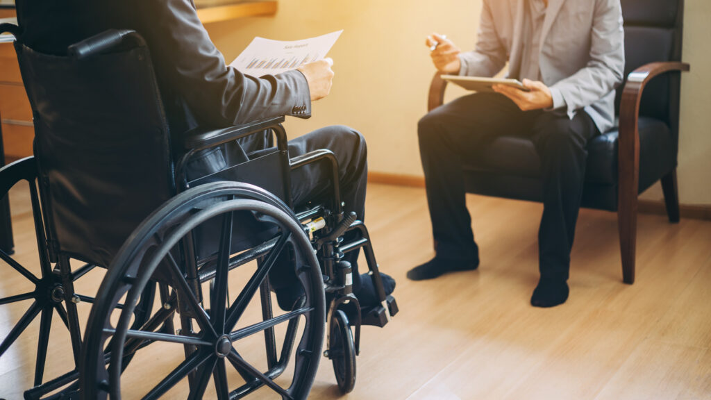 Spinal Cord Injury Lawyer Meeting With Injured Victim